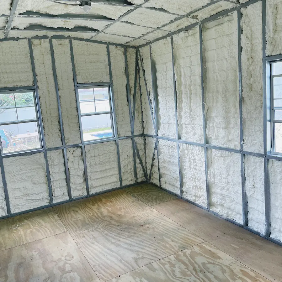 Closed-cell spray foam insulation applied to wall cavities in a residential project in Willows